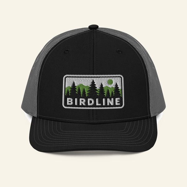 Birdline Pine Ridge Trucker Hat in Black / Charcoal, front view